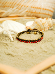 Red Beaded Bracelet with Brass Accents